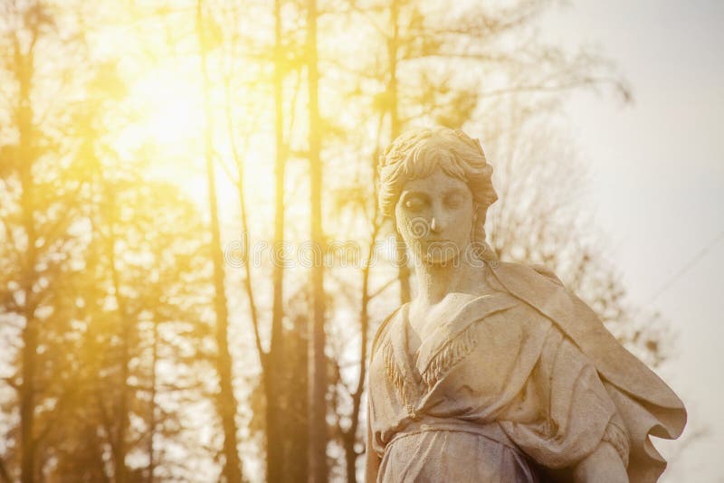 The goddess of love in Greek mythology, Aphrodite Venus in Roman mythology Fragment of ancient statue in sunlight