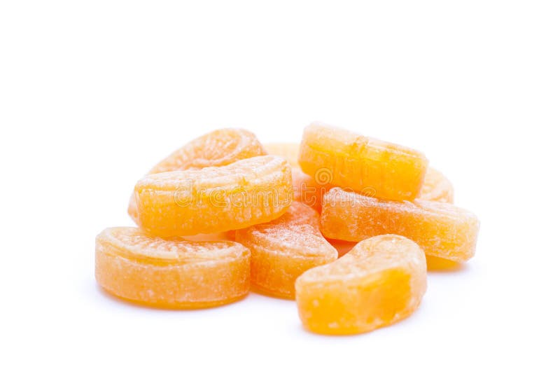 Orange fruit candy over white background. Orange fruit candy over white background