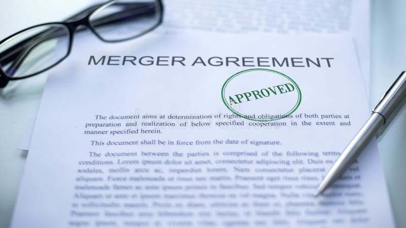 Merger agreement approved, seal stamped on official document, business contract, stock photo. Merger agreement approved, seal stamped on official document, business contract, stock photo