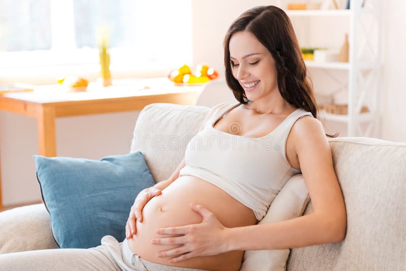 She is going to be a mom soon. stock photo She is going to be a mom soon. stock photo