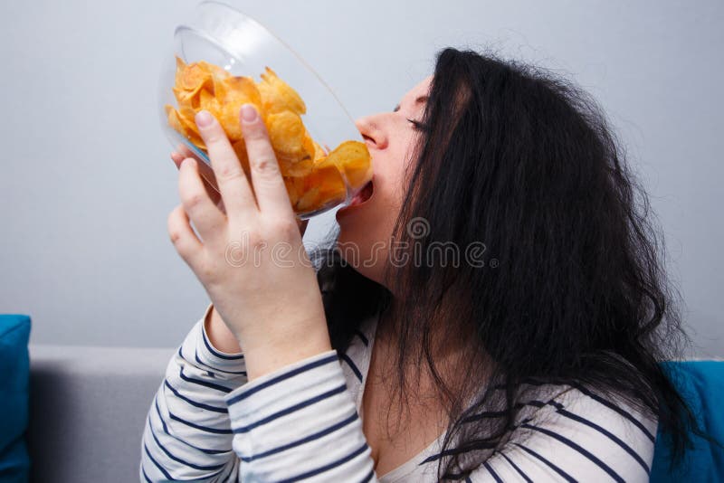 Gola, obesità, cibo non sano, cattive abitudini, dipendenza dell'alimento, fotografia stock Gola, obesità, cibo non sano, cattive abitudini, dipendenza dell'alimento, fotografia stock