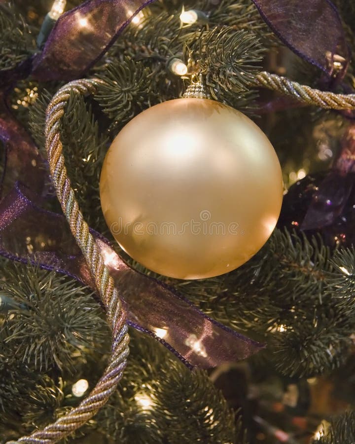 Gold Ball and Cord Ornament stock photo