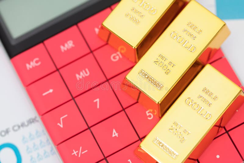 Gold Bar On Calculator Calculator On Paper Document Stock Image Image gold-bar-on-calculator-calculator-on-paper-document-stock-image-image