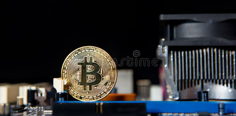 Gold Bitcoin electronic computer processor board royalty free stock photography