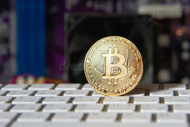 Gold Bitcoin electronic computer processor board royalty free stock image