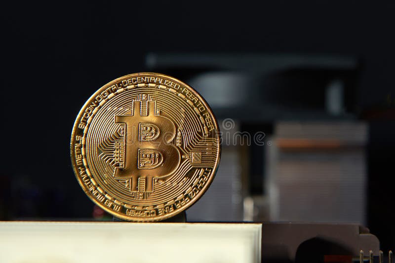 Gold Bitcoin electronic computer processor board royalty free stock image
