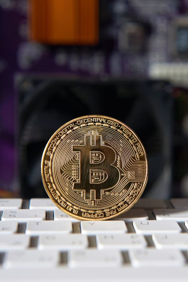 Gold Bitcoin electronic computer processor board stock photography