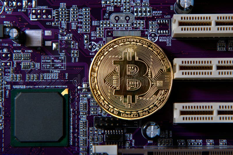 Gold Bitcoin electronic computer processor board stock photo