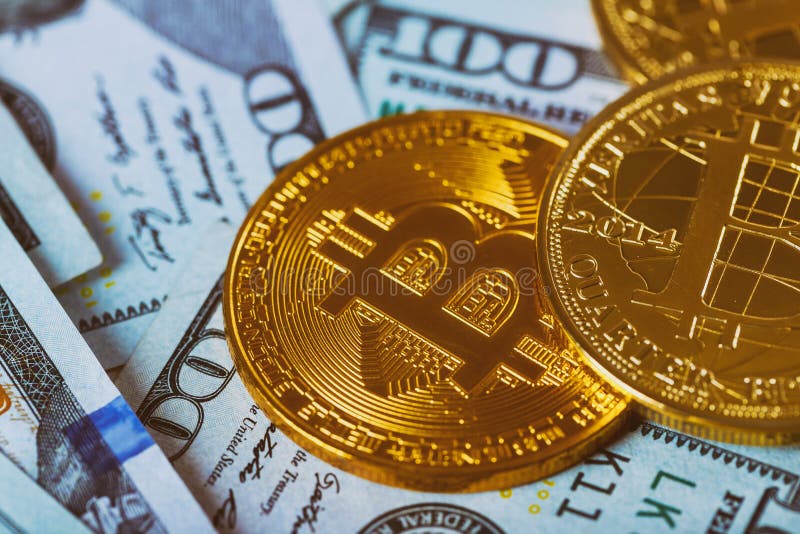 Gold Bitcoin on hundred dollars bills. Bitcoin on us dollar bills electronic money exchange concept. Close-up. stock photos Gold Bitcoin on hundred dollars bills. Bitcoin on us dollar bills electronic money exchange concept. Close-up. stock photos