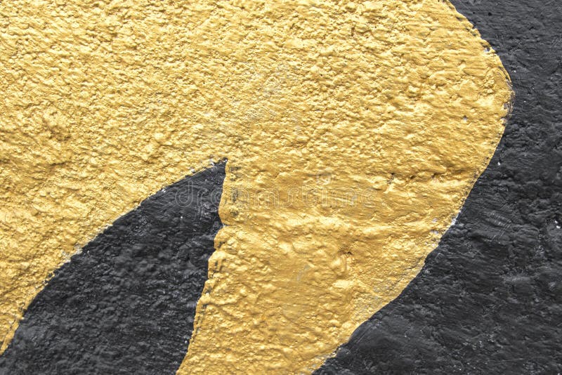 Gold and Black Painted Design on Concrete Wall Background and Wallpaper