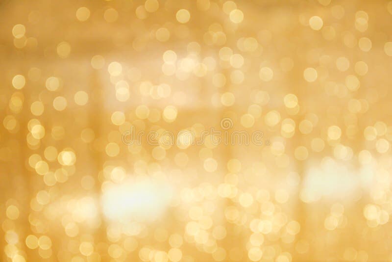 Close up Gold bokeh sparkle glitter abstract patterns for Christmas and Happy new year background