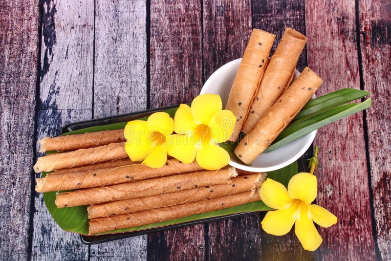 Gold candy rolls ,Thai sweetmeat made of flour, coconut milk and royalty free stock photos Gold candy rolls ,Thai sweetmeat made of flour, coconut milk and royalty free stock photos