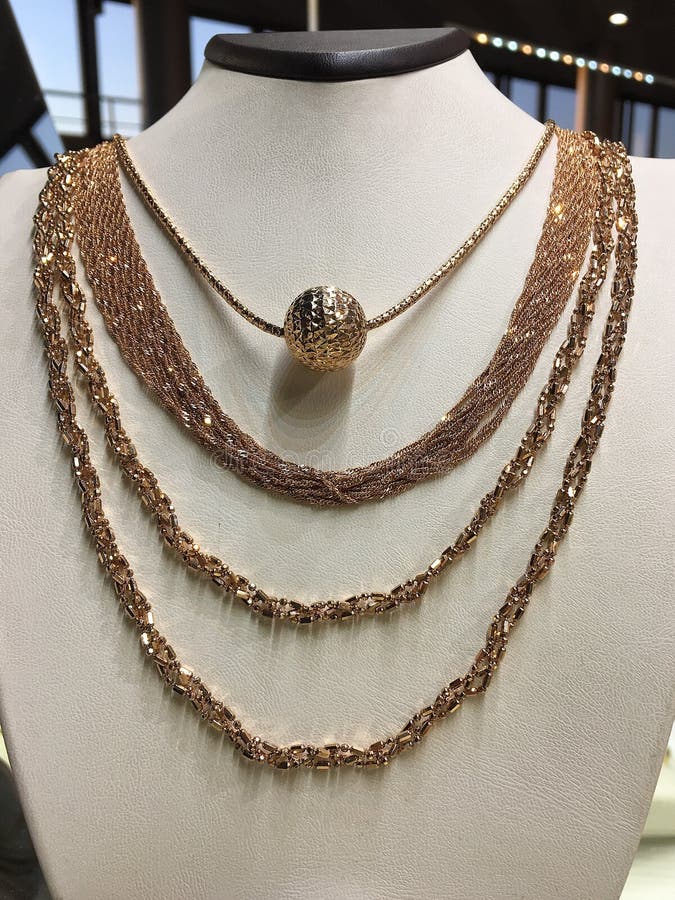 Gold Chains on a Jewelry Stand in the Shop. Stock Photo Image of