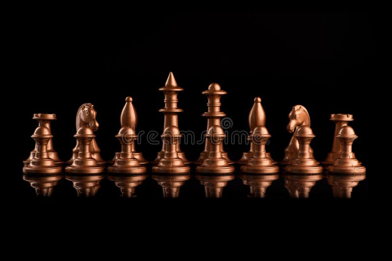 Gold Chess Pieces on Black Surface · Free Stock Photo