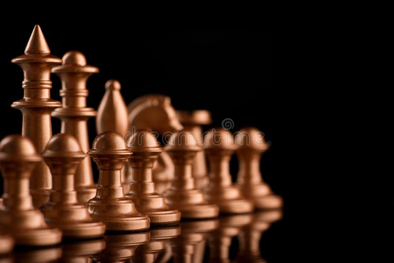 Gold Chess Pieces on Black Surface · Free Stock Photo