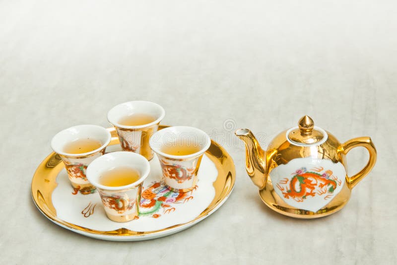 Gold chinese tea set stock photo. Image of teapot, heat 33595718