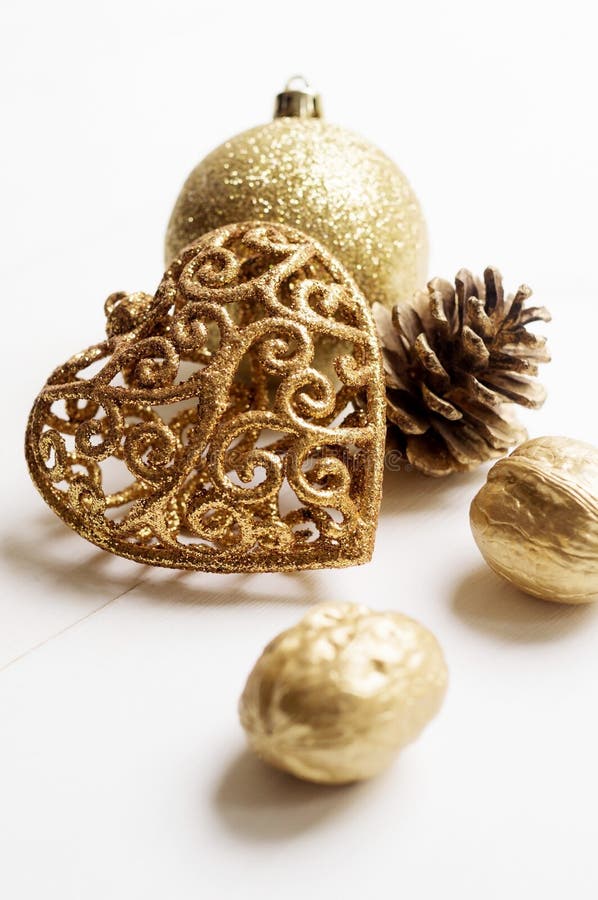 Gold Christmas decoration on white background.