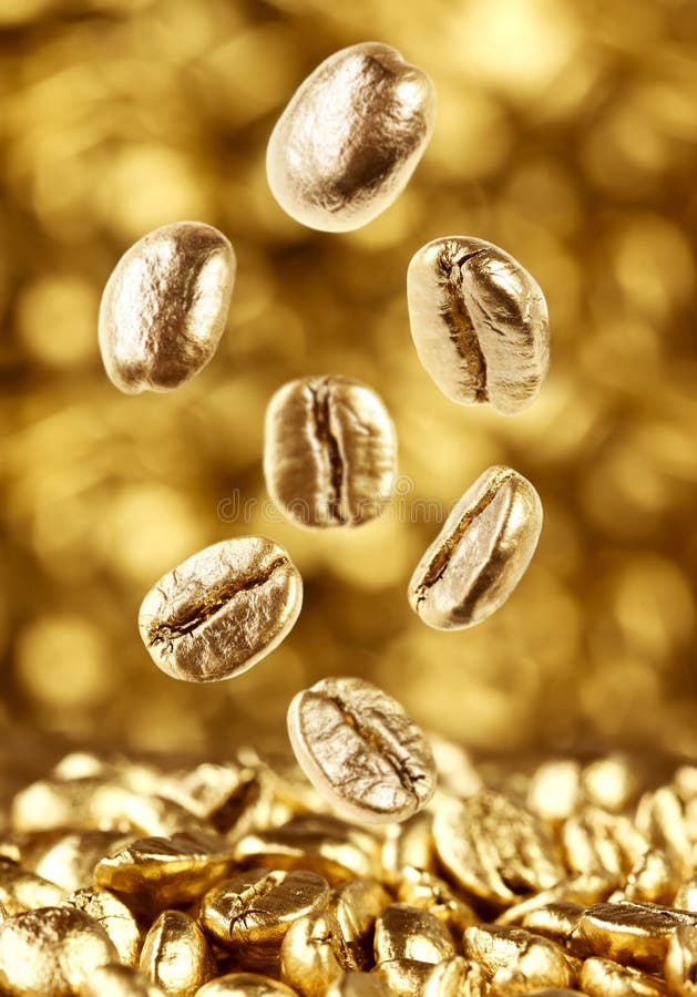 Gold coffee beans stock photo. Image of falling, coffee 36097312