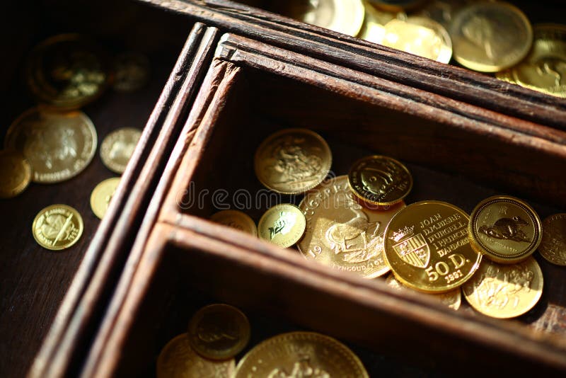 Gold coins in wooden casket