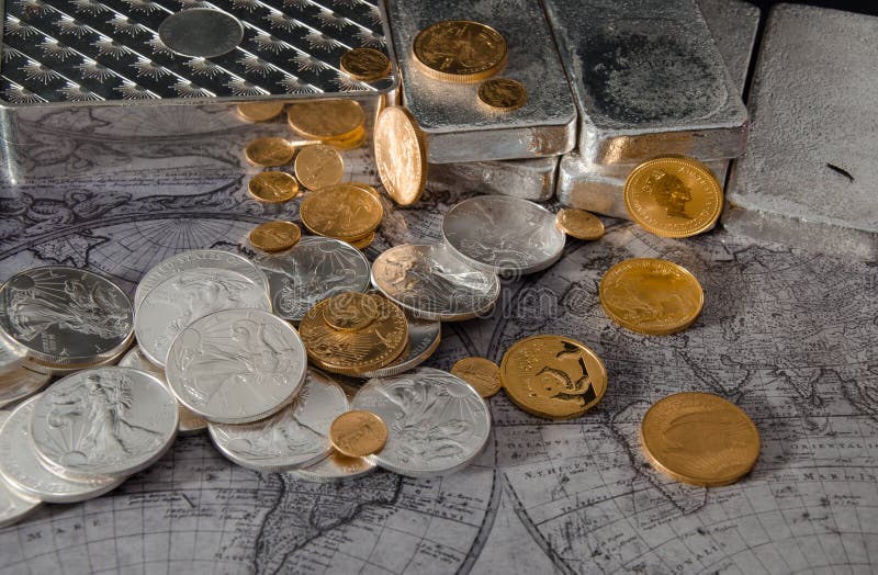 Gold Eagle & Silver Eagle Coins with Silver Bars on Map stock image