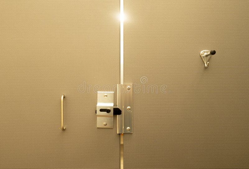 Gold Finished Bathroom Door Assembly Hooks Handle and Latch Stock Photo