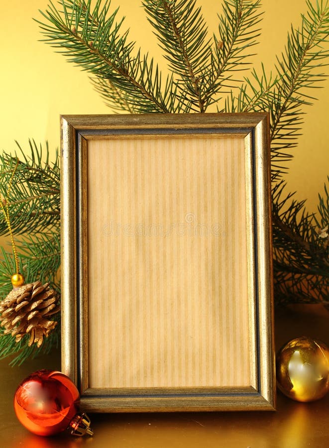 Gold frame and Christmas decorations