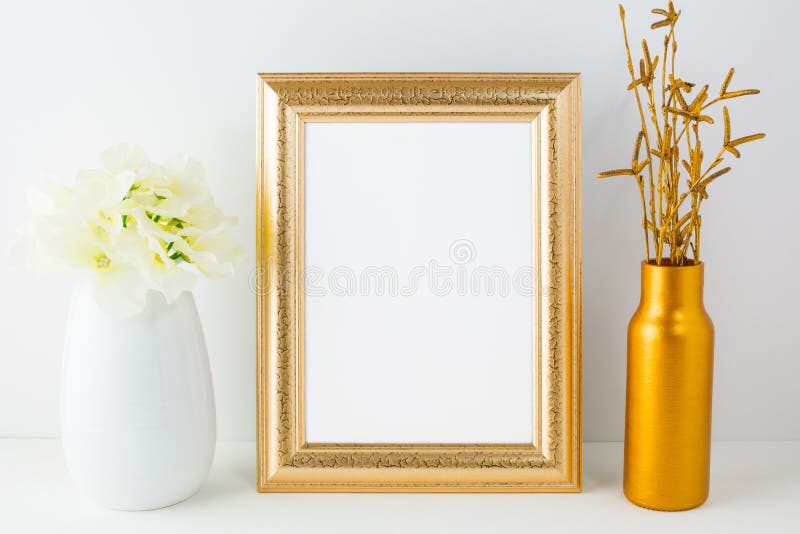 Gold Frame Mockup with Golden Vase and Ivory Hydrangea Stock Photo