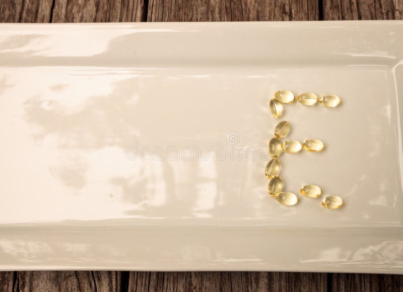 Gold Gel Capsule of Vitamin E Stock Image Image of capsule, capsules