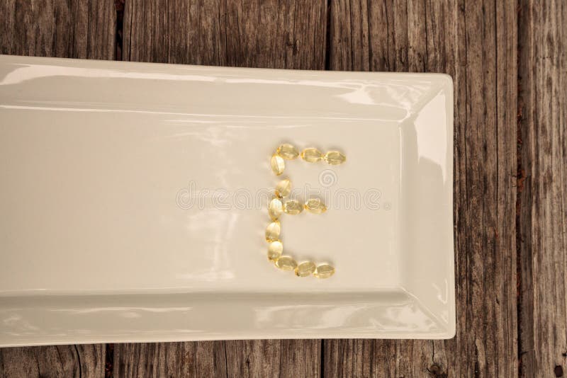 Gold Gel Capsule of Vitamin E Stock Image Image of therapy, pill