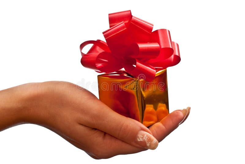 Gold gift box in woman s hand