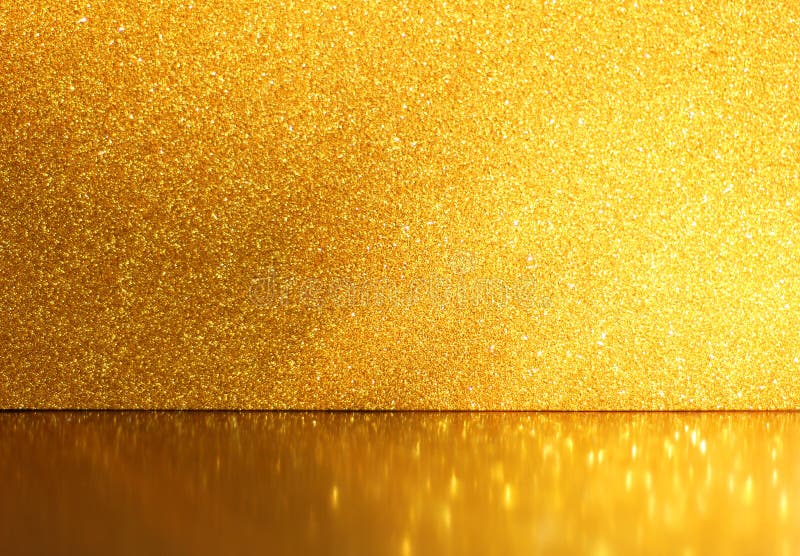 Gold glitter background, selective focus, golden reflections