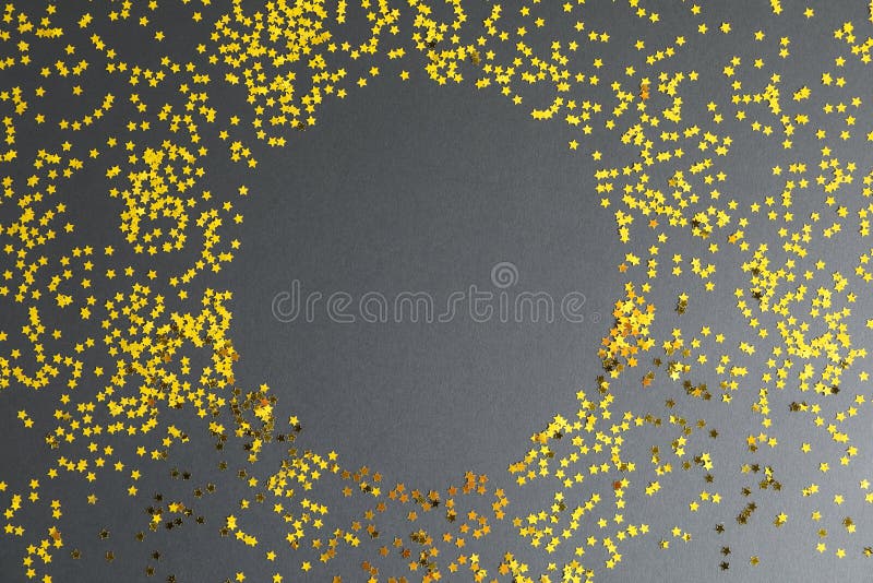 Gold glitter stars circle on black background royalty free stock photo Gold glitter stars circle on black background royalty free stock photo