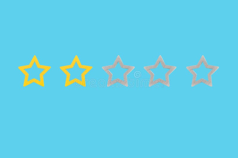 Gold, gray, silver five star shape on a blue background. The best excellent business services rating customer experience concept. Concept image of setting a five star goal,. Gold, gray, silver five star shape on a blue background. The best excellent business services rating customer experience concept. Concept image of setting a five star goal,