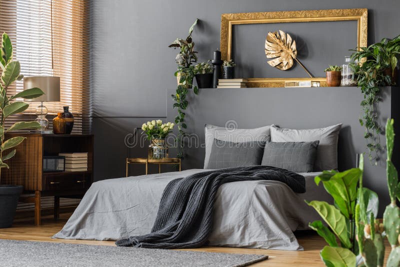 Gold and grey elegant bedroom royalty free stock image