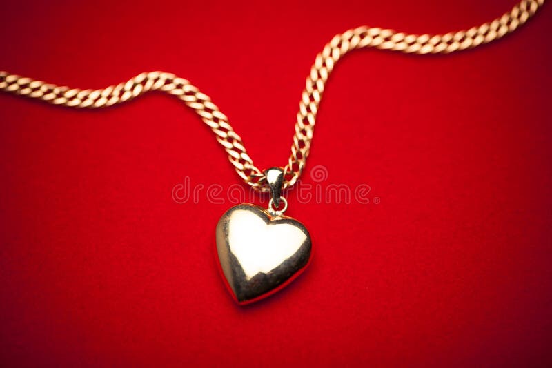 Gold heart pendant stock photo. Image of gold, valentine 49193578