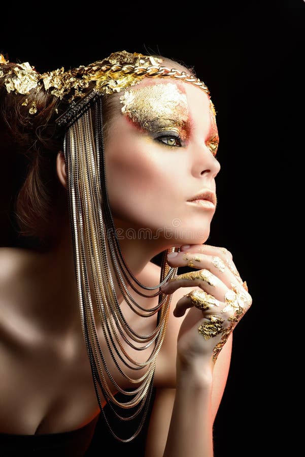 Beauty Woman with Golden Metallic Skin. Gold Paint Smudges Drips from the  Face and Lips Stock Image - Image of colour, lipgloss: 151974497