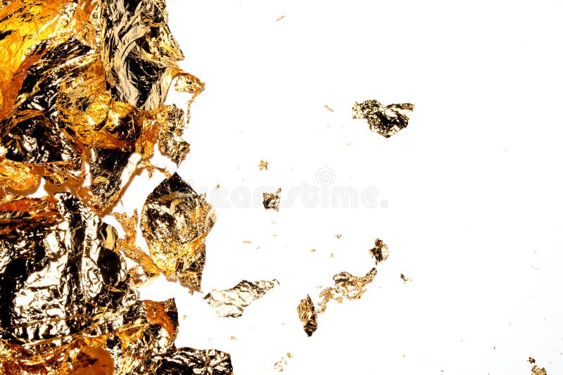Gold Leaf Pieces Close Up on a White Background As Decorative Pieces