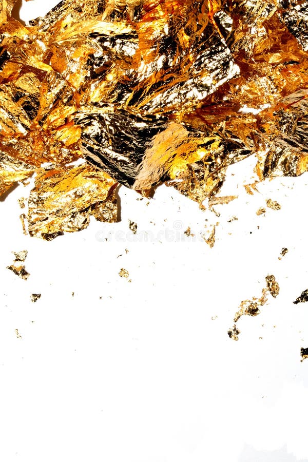 Gold Leaf Pieces Close Up on a White Background As Decorative Pieces