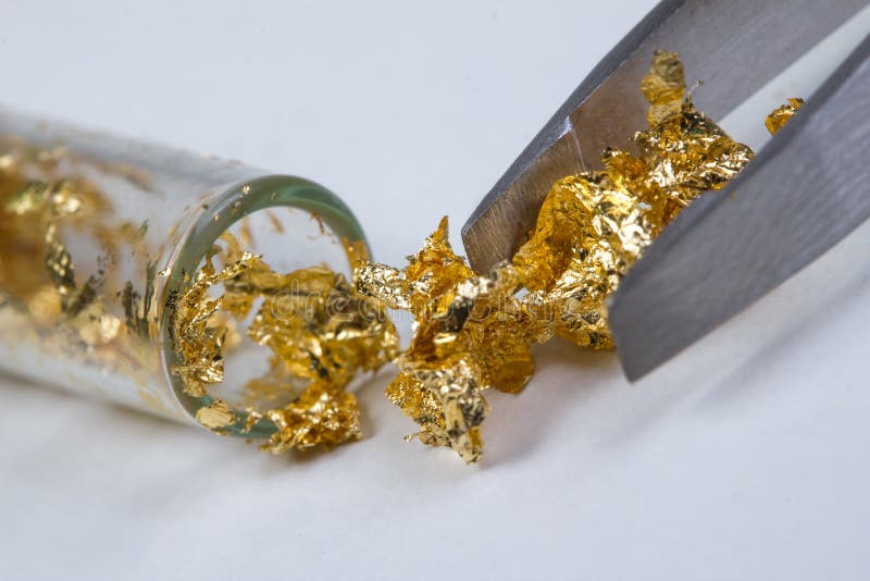 Gold leaf pieces stock image. Image of ampoule, bumpy 55342523