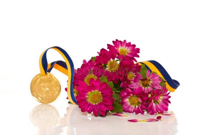 Gold medal with flowers