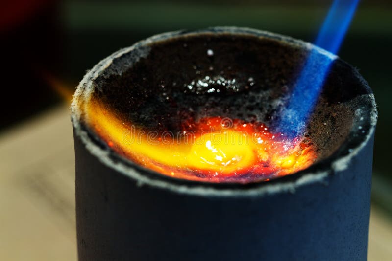 Gold melting stock image. Image of hold, holding, industry 27641435