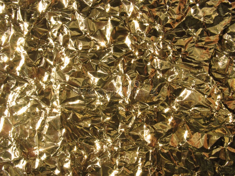Gold aluminum foil texture., Stock image