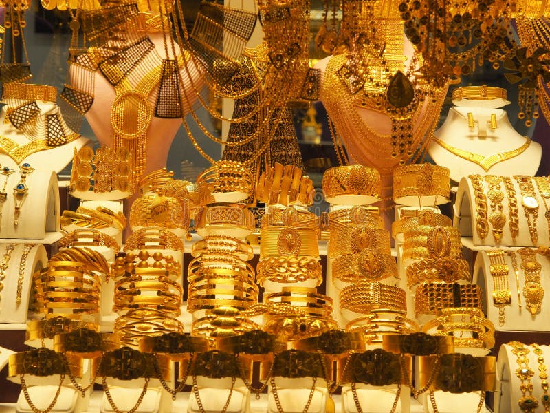 Gold necklaces, bracelets and various jewelery sold in a jewelery store at turkey. stock photo Gold necklaces, bracelets and various jewelery sold in a jewelery store at turkey. stock photo