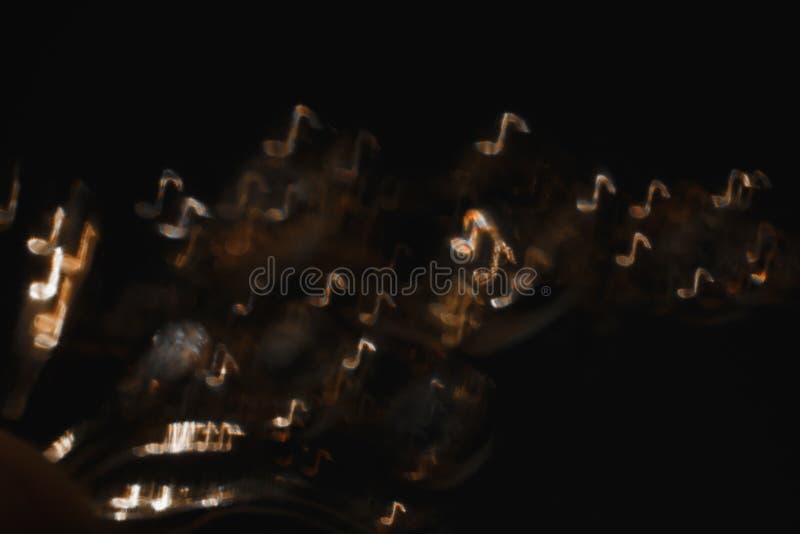 Gold Notes on Black Background Stock Photo - Image of maroon, modern