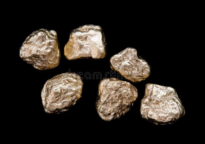 Gold nuggets stock images