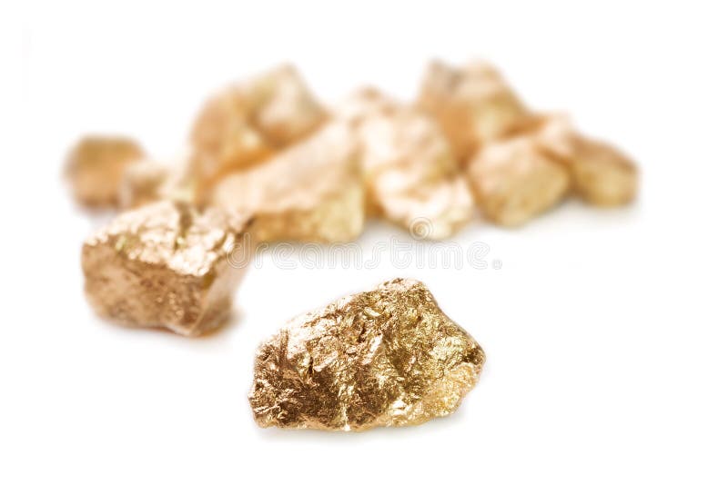 Gold nuggets on white background. royalty free stock image
