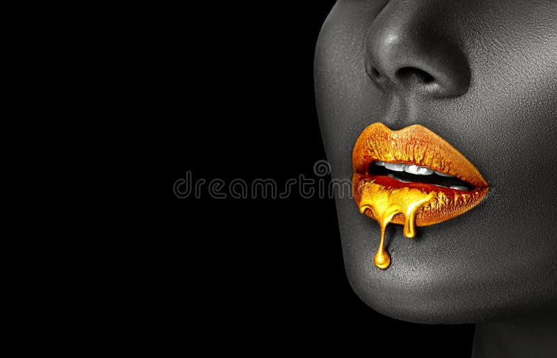 Gold Paint smudges drips from African American woman face, lips lipgloss dripping from sexy lips, golden liquid drops