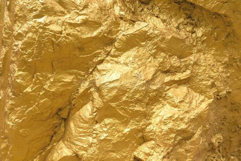 Gold Paint Stone or Rock Texture Glitter Abstract on Background Stock
