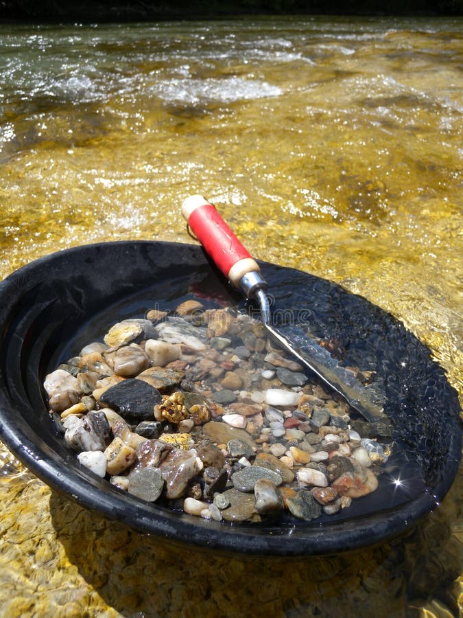 Gold pan stock images