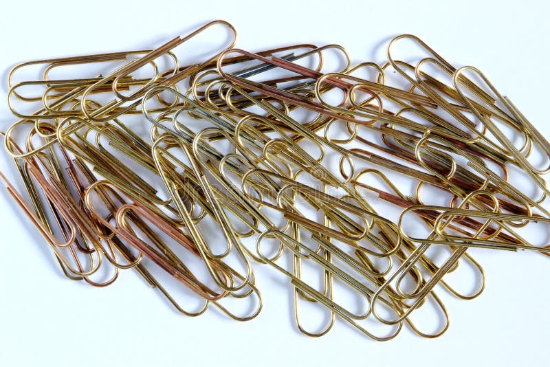 Gold paper clips stock photo. Image of steel, document 103400214